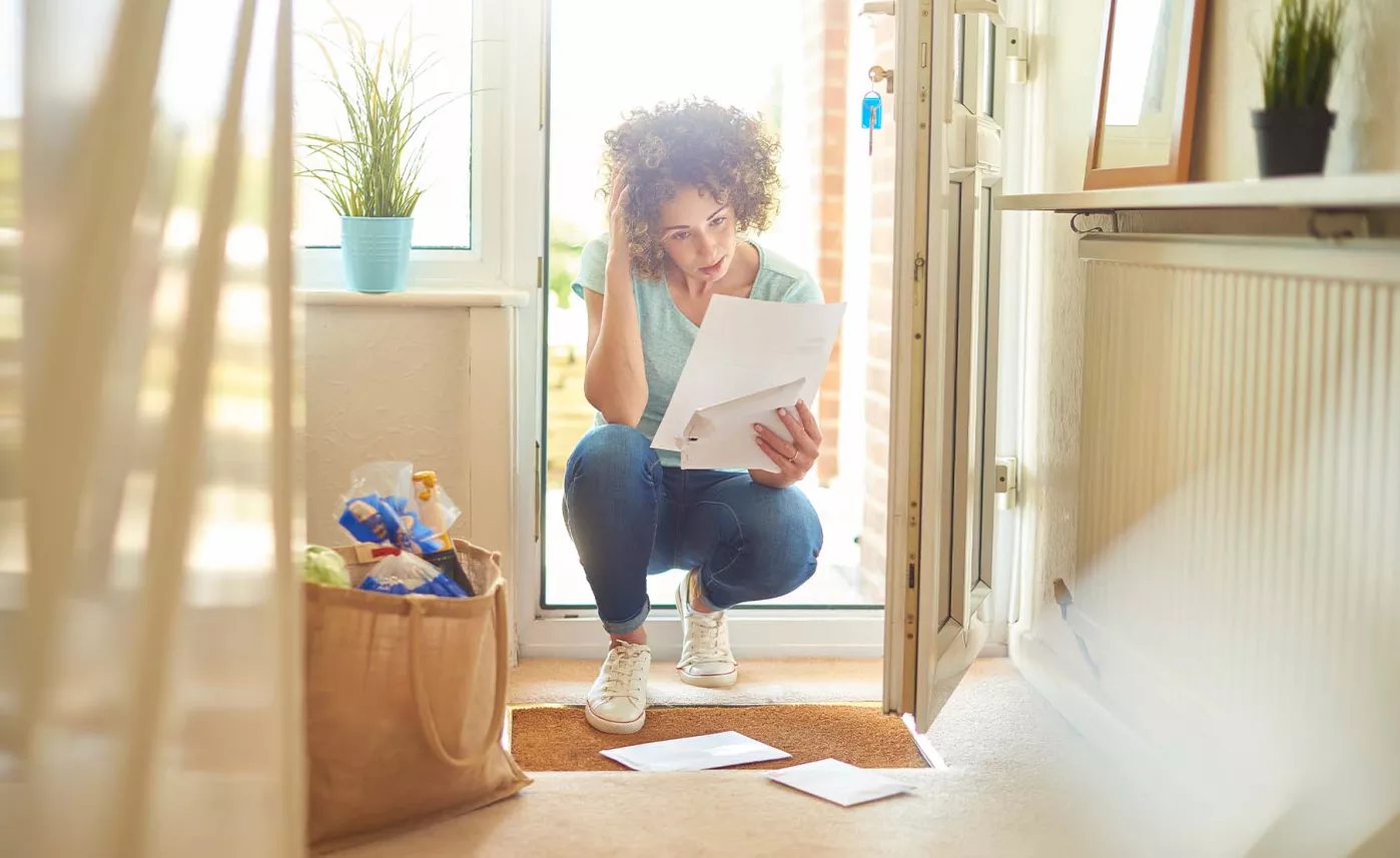  Woman looking at mail
