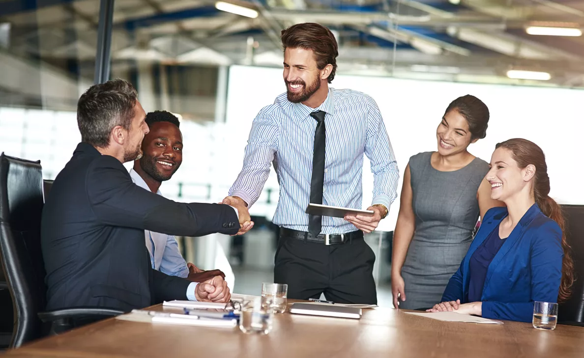  An Edward Jones client wraps up a meeting with a dedicated team of advisors that gave him personalized service.
