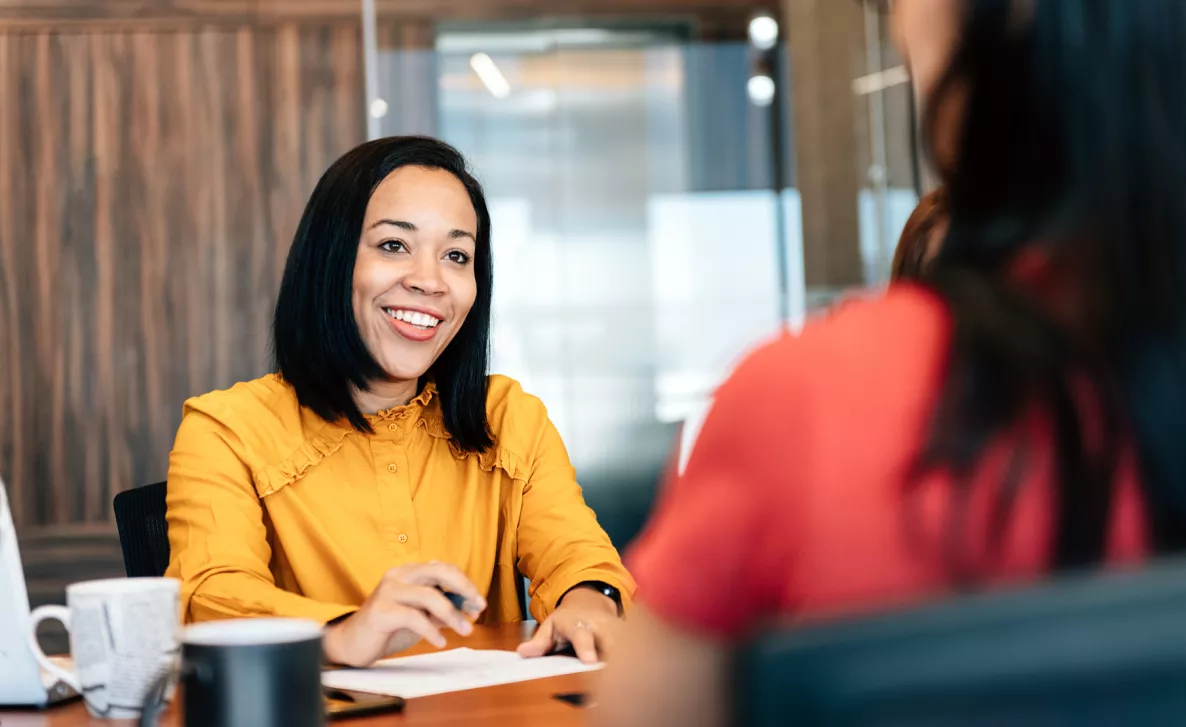  An Edward Jones financial advisor discusses options with a client.
